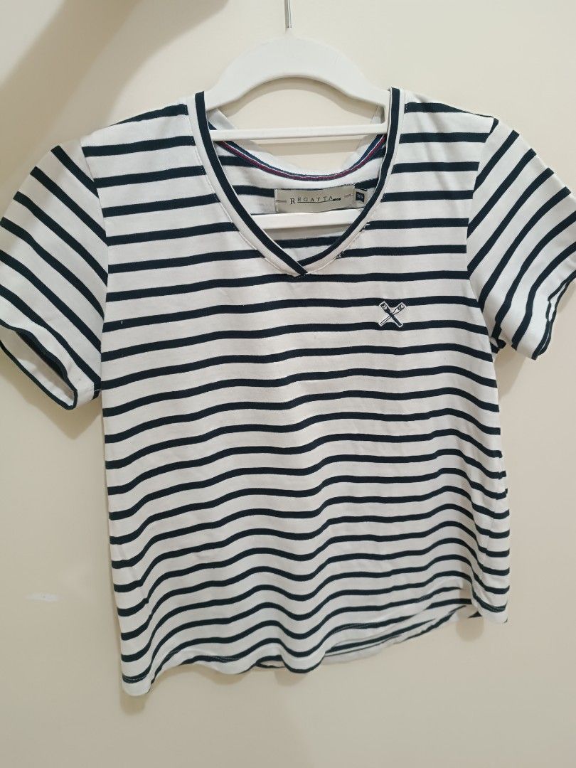 Regatta Striped V-Neck T-Shirt (Category: Shirts) located in Calamba. Submitted by hannahney (Listing ID 1458791457, Image 1). Description: - Classic navy and white stripes - Brand: Regatta - V-neckline - Short sleeves - Small embroidered logo on chest - Comfortable and versatile for everyday wear.