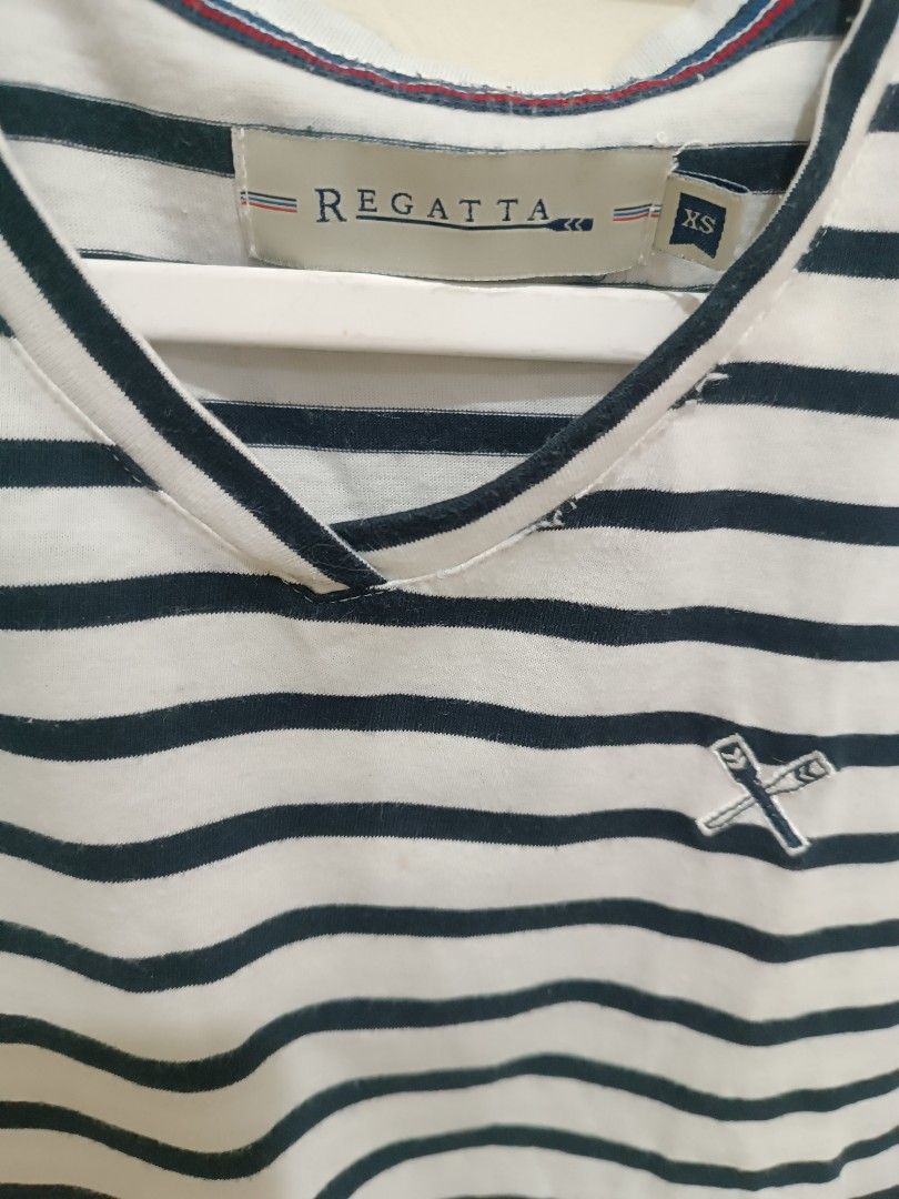 Regatta Striped V-Neck T-Shirt (Category: Shirts) located in Calamba. Submitted by hannahney (Listing ID 1458791457, Image 2). Description: - Classic navy and white stripes - Brand: Regatta - V-neckline - Short sleeves - Small embroidered logo on chest - Comfortable and versatile for everyday wear.