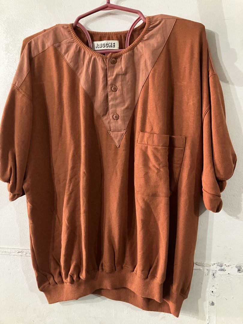 Relaxed fit pull over shirt by jboche (Category: Blouses) located in Angeles City. Submitted by jnwsurplus (Listing ID 1458722408, Image 1). Description: rust-orange relaxed-fit pullover features a distinctive V-shaped contrast front yoke and a casual chest pocket. Width 60cm Long 57cm Shoulder 20cm.