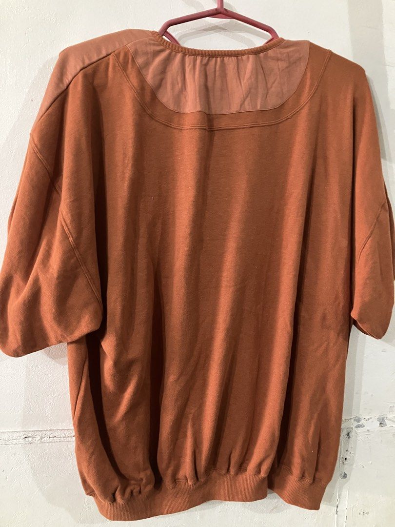 Relaxed fit pull over shirt by jboche (Category: Blouses) located in Angeles City. Submitted by jnwsurplus (Listing ID 1458722408, Image 2). Description: rust-orange relaxed-fit pullover features a distinctive V-shaped contrast front yoke and a casual chest pocket. Width 60cm Long 57cm Shoulder 20cm.