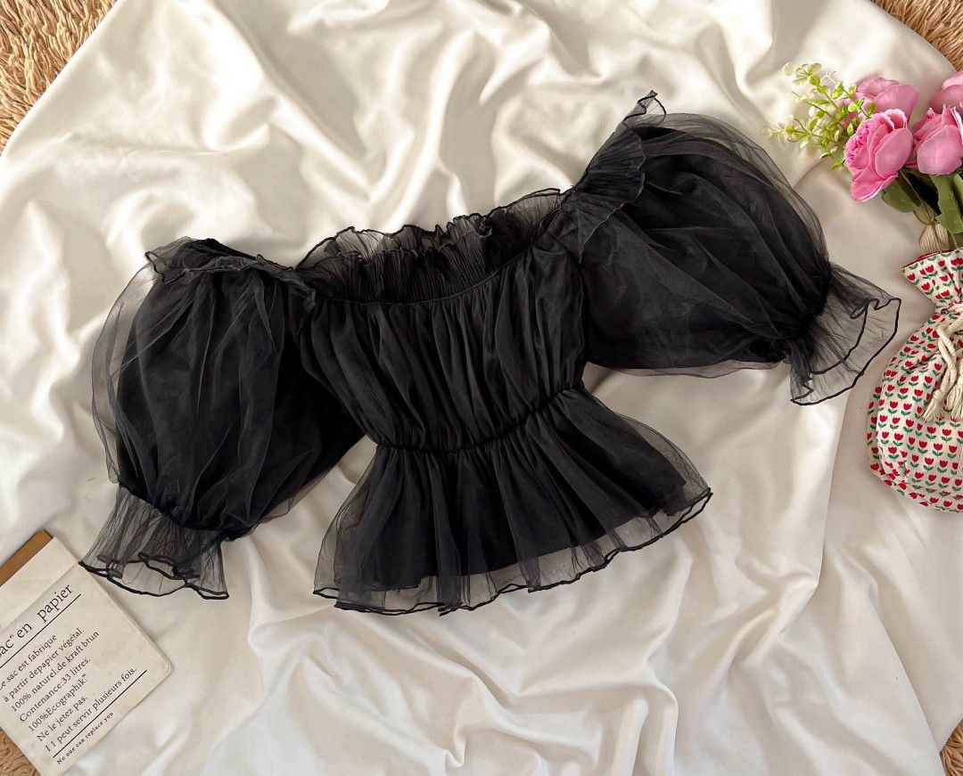 Romantic Black Puff-Sleeve Blouse (Category: Blouses) located in Manila. Submitted by dear.naiah (Listing ID 1458753937, Image 1). Description: • Sheer statement puff sleeves •Ruched and fitted bodice •Flattering peplum silhouette •Feminine & romantic style •Easy to dress up or down.