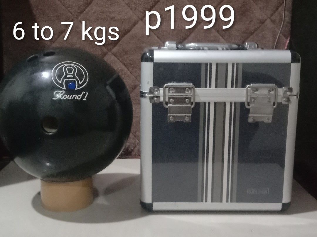 Round 1 Bowling Ball with Case and Bag (Category: Billiards and Bowling) located in Manila. Submitted by redvincent01640 (Listing ID 1458703898, Image 1). Description: - Round 1 bowling ball - Weight: 6 to 7 kgs - Includes hard case - Comes with a black bowling bag - Ideal for casual bowlers - Price is firm - Feel free to ask questions!.