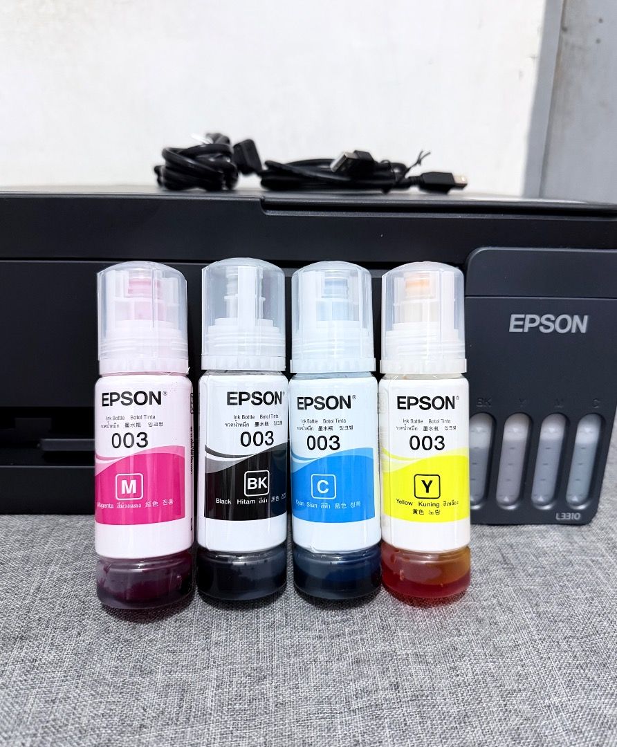 Epson EcoTank L3310 — LIKE NEW (Category: Printers, Scanners & Copiers) located in Las Pinas. Submitted by silvermoon.94702e (Listing ID 1458710696, Image 3). Description: Barely used! Less than 30 pages printed. 📌 Bought August 23, 2026 📌 Selling because we upgraded to a wireless printer 📌 Complete set ✅ Original box ✅ Original receipt ✅ Warranty documents ✅ Original Epson ink — remaining ✅ Original power cord ✅ Original USB cable ✅ No issues