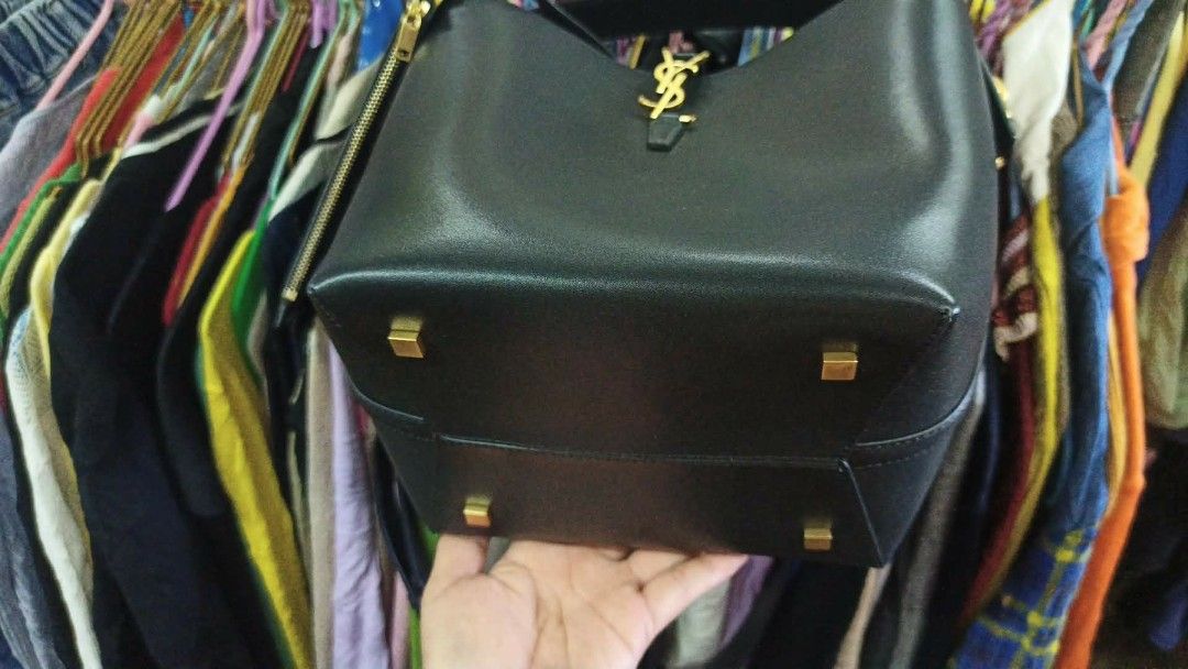 Saint Laurent Black Leather Hobo Bag with Pouch (Category: Luxury Bags & Wallets) located in Baguio. Submitted by XycerlynCLXN (Listing ID 1458802007, Image 3). Description: - Authentic Saint Laurent black leather hobo bag - Comes with a matching card holder pouch - Elegant gold hardware details - Expertly crafted in Italy - Clean interior, ready for your essentials - Ideal for everyday style and practicality.
