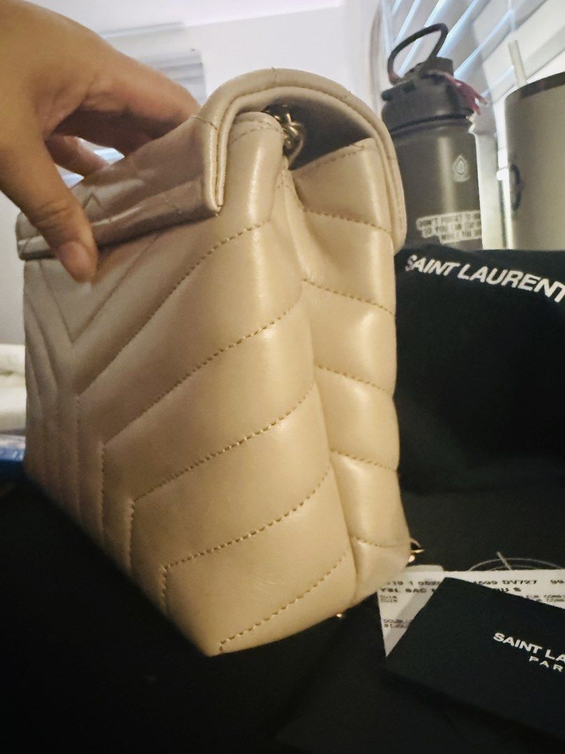 Saint Laurent Lou Bag Beige Leather (Category: Luxury Bags & Wallets) located in Cainta. Submitted by shbalt83 (Listing ID 1458713631, Image 3). Description: - Authentic Saint Laurent Lou - Color: Beige - Material: Quilted leather - Hardware: Gold chain strap - Includes: Authenticity certificate and dust bag.