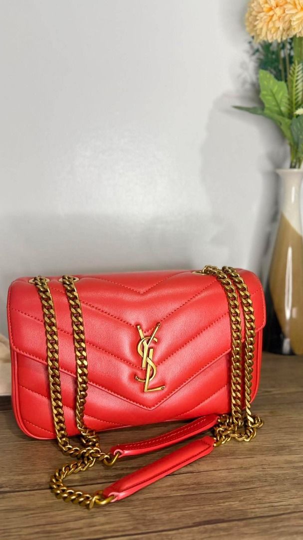 Saint Laurent Red Chevron Leather Chain Bag (Category: Luxury Bags & Wallets) located in Caloocan City. Submitted by lovelj_2026 (Listing ID 1458832860, Image 2). Description: YSL Loulou ₱4,500 💯authentic japan sourced preloved bag🇯🇵 - Authentic red Saint Laurent bag - Elegant gold hardware - Classic chevron leather pattern - Versatile chain strap - Interior Saint Laurent Paris logo - Secure snap closure - Made in Italy - Ideal for evening wea