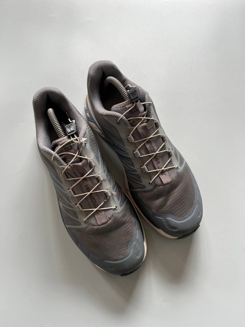 SALOMON XT WINGS 2 GREY (9.5US) (Category: Sneakers) located in Baguio. Submitted by grabUrPairs (Listing ID 1458718899, Image 2). Description: - Salomon XT Wings 5 GTX trail running shoes - Color: Grey and Blue - Quicklace system for easy on/off - Contagrip outsole for excellent grip - Perfect for trail running and outdoor adventures - Note: Minor scuffs on the midsole.