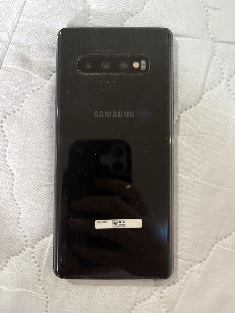 Samsung Galaxy S10+ (128 GB) (Category: Samsung) located in Pasay City. Submitted by enzopeco (Listing ID 1458700987, Image 2). Description: Samsung Galaxy S10+ (128 GB) 128 GB No box, no charger All Original parts Original battery (half day use kaya) Issues: broken lcd, maluwag back cover, buttons natanggal na 5,000 pesos PM for more inquiries.