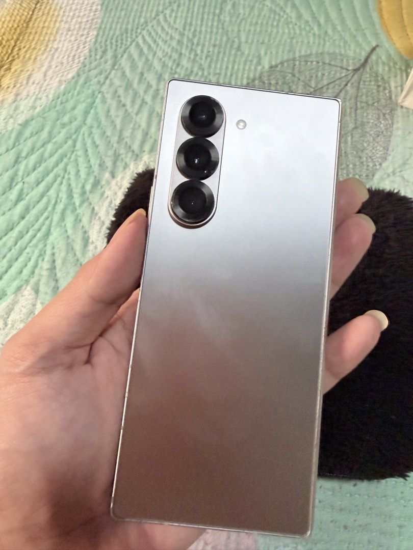Samsung z Fold 6 Rush sale (Category: Samsung) located in Manila. Submitted by truestone.80f642 (Listing ID 1458775062, Image 3). Description: - Selling my Samsung Galaxy Z Fold 6 - Silver Shadow Edition - Dual Physical Sim - 5G Openline to all Networks - E-sim supported din - Perfect for Gaming and Photography - Snapdragon 8 Gen 3 - Super Fast - 72MP Ai Camera - 24GB RAM - Matagal malobat - No issue sa performance - Solid na solid sa gaming. - W