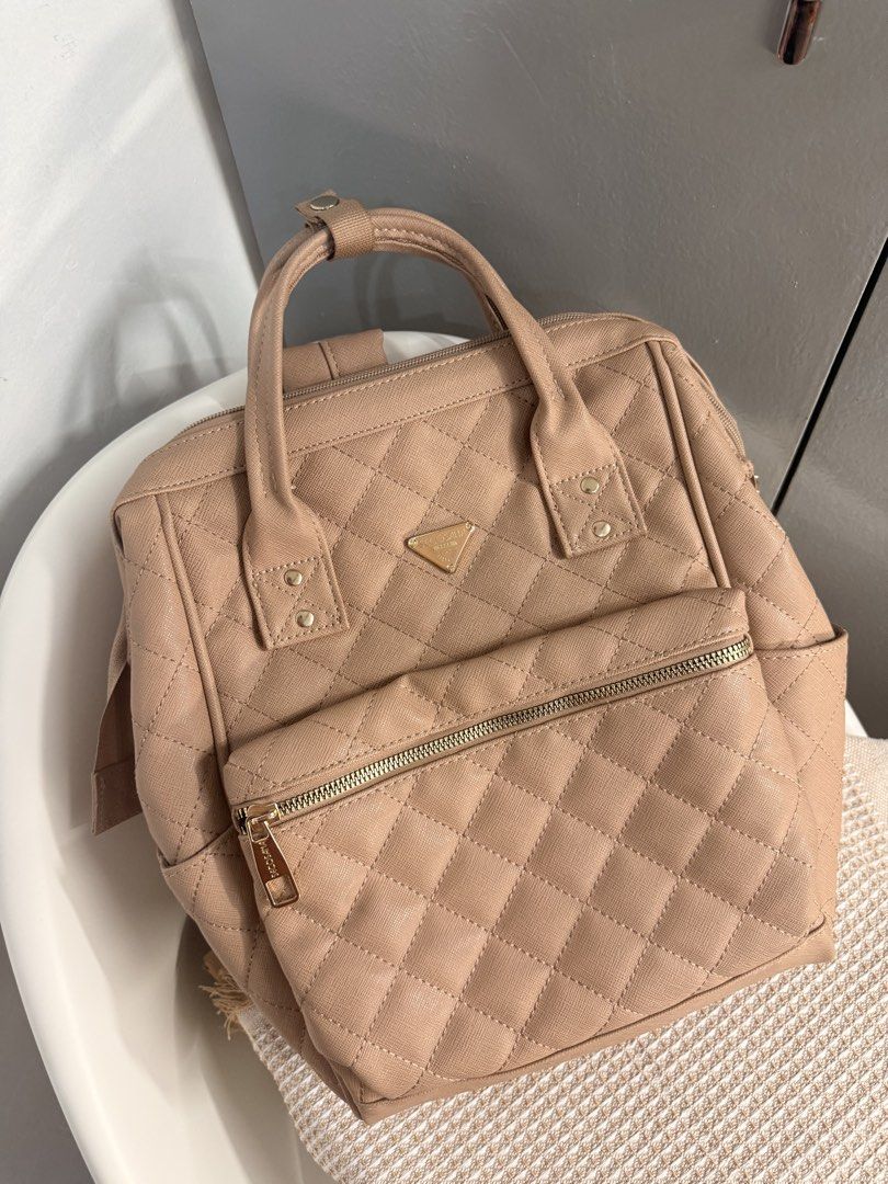 Secosana Backpack ( Old rose) (Category: Backpacks) located in Dasmarinas. Submitted by _sissycollections (Listing ID 1458865560, Image 2). Description: Condition: 9/10 With packet at the back of the bag Ither details can explain via pm .