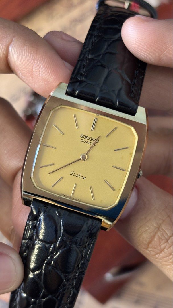 Seiko Dolce 1973 GHA (Category: Men's Watches) located in Cavite. Submitted by marenghype (Listing ID 1458723814, Image 2). Description: ‼️Seiko Dolce 1963 ‼️ A unique vintage Seiko with a great story behind it—over 50 years old and still looking timeless. Featuring the distinctive GHA case, elegant gold-tone dial, and sapphire crystal, paired with a black crocodile-pattern leather strap. ☑️ Ref 6020-5980 ☑️ serial 137693 ☑️ bmby Jan 1973 ☑️ all 