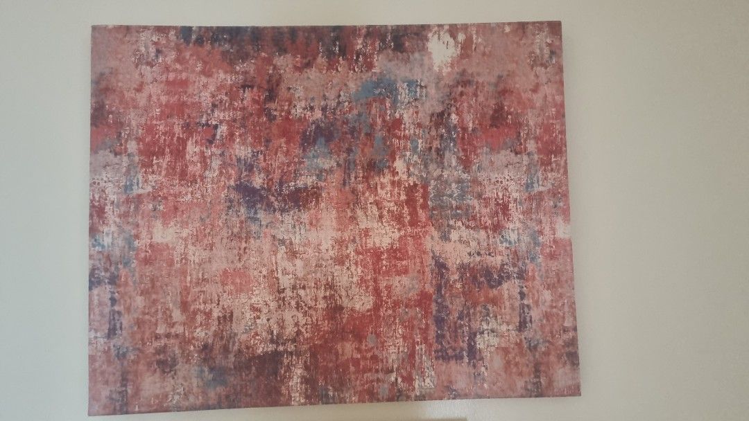 Set of 2 abstract canvas wall art (Category: Wall Decor) located in Binan City. Submitted by nicegaragesale (Listing ID 1458758307, Image 3). Description: - Set of 2 abstract canvas paintings, price is for the 2 combined. - Vibrant red, pink, and purple tones in one piece - Calming blue, grey, and beige tones in the other - Features a unique textured and distressed finish - Adds a pop of color and artistic flair to any space - Available for purch