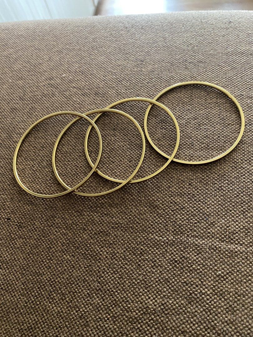 Set of 4 Gold Tone Thin Bangles (Category: Bracelets) located in Makati City. Submitted by dpjanssen (Listing ID 1458711460, Image 1). Description: - Set of 4 thin bangles - Simple and classic design - Gold tone finish - Perfect for stacking or wearing individually - Lightweight and comfortable for all-day wear - A versatile accessory to complement any outfit.