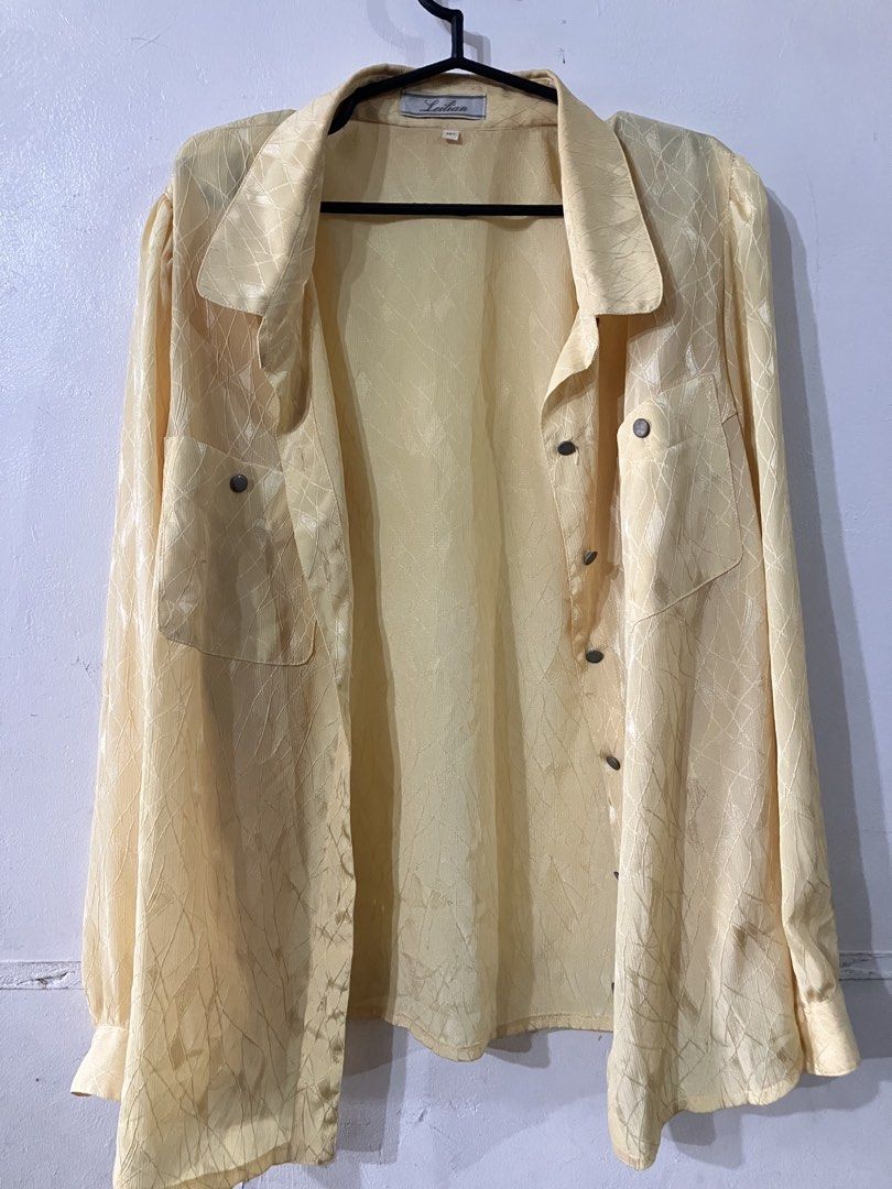 Sheer long sleeves button up blouse (Category: Blouses) located in Angeles City. Submitted by jnwsurplus (Listing ID 1458718056, Image 1). Description: light yellow, sheer long-sleeve button-up blouse with a subtle textured pattern and front pocket details..