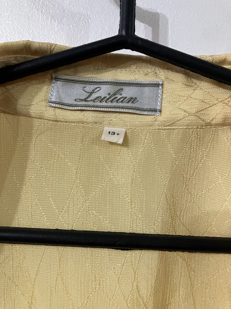 Sheer long sleeves button up blouse (Category: Blouses) located in Angeles City. Submitted by jnwsurplus (Listing ID 1458718056, Image 3). Description: light yellow, sheer long-sleeve button-up blouse with a subtle textured pattern and front pocket details..