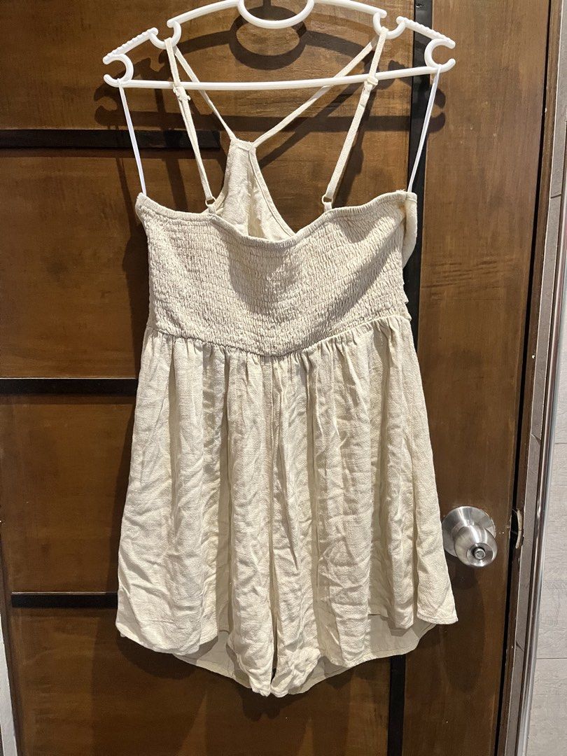 SHEIN Beige Smocked Romper (Category: Rompers) located in Las Pinas. Submitted by francesaly (Listing ID 1458883272, Image 2). Description: - slightly negotiable - Cute beige romper from SHEIN - Size XL - Smocked bodice - Adjustable criss-cross straps at the back - Linen-like fabric - Ideal for casual outings or beach days.
