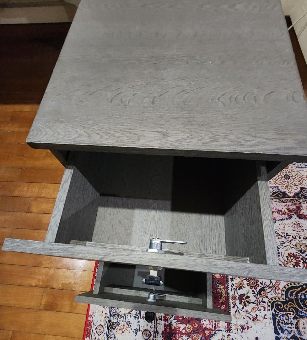 Side table (Category: Tables & Sets) located in Singapore. Submitted by inc3083489 (Listing ID 1458783780, Image 3). Description: Drawer with lock Comes as a set of 2 Wheels not working One for 20 , two for 25.