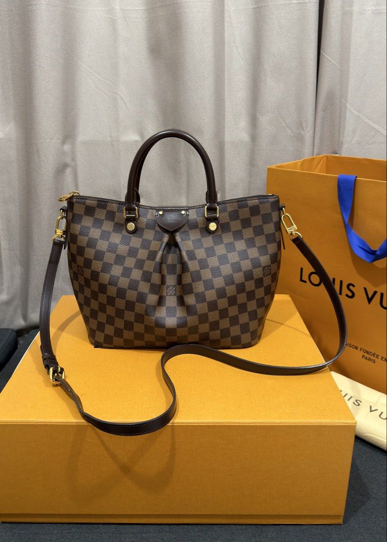 Siena MM Damier Ebene Canvas (Category: Luxury Bags & Wallets) located in Manila. Submitted by luxuryprelovedbagsby_by_agnes (Listing ID 1458728608, Image 1). Description: Siena MM Damier Ebene Canvas Php 85,000 Excellent Condition Dimensions: 30cm x 24 cm x 15cm.