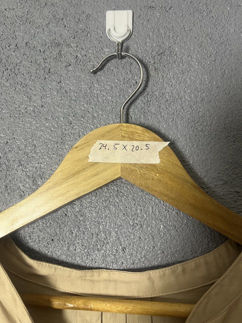 SIMPLICITY Beige Gathered Waist V-Neck Top (Category: Sleeveless) located in Famy. Submitted by basicthrifted (Listing ID 1458728534, Image 3). Description: - Brand: SIMPLICITY - Color: Beige - Neckline: V-neck - Details: Subtle pleats, gathered elastic waist for a flattering silhouette - Sleeves: Short sleeves - Material: 100% Cotton - Origin: Made in China - Estimated Size: Medium (M).