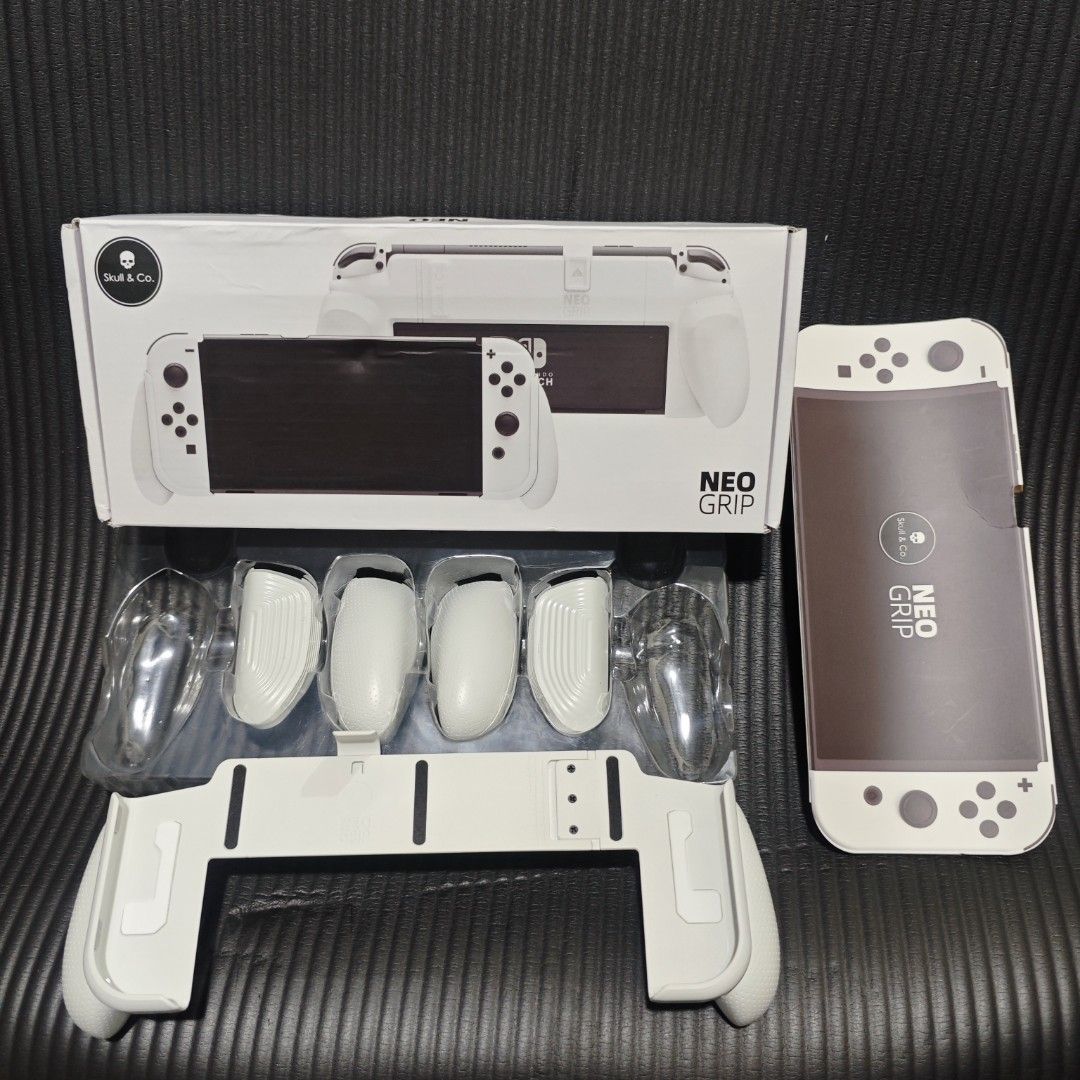 Skull & Co Neo Grip White for Nintendo Switch Oled (Category: Cases & Covers) located in Quezon City. Submitted by shopme_gadget30 (Listing ID 1458843423, Image 1). Description: kindly read the details first for sale fixed price mint Condition skull & co neo grip white with 2 extra pair of grip holder compatible to Nintendo switch oled below srp Shoopppppeee —,✅ can check out pm for the linnnkkk (If shoopppee check out, price is higher because of