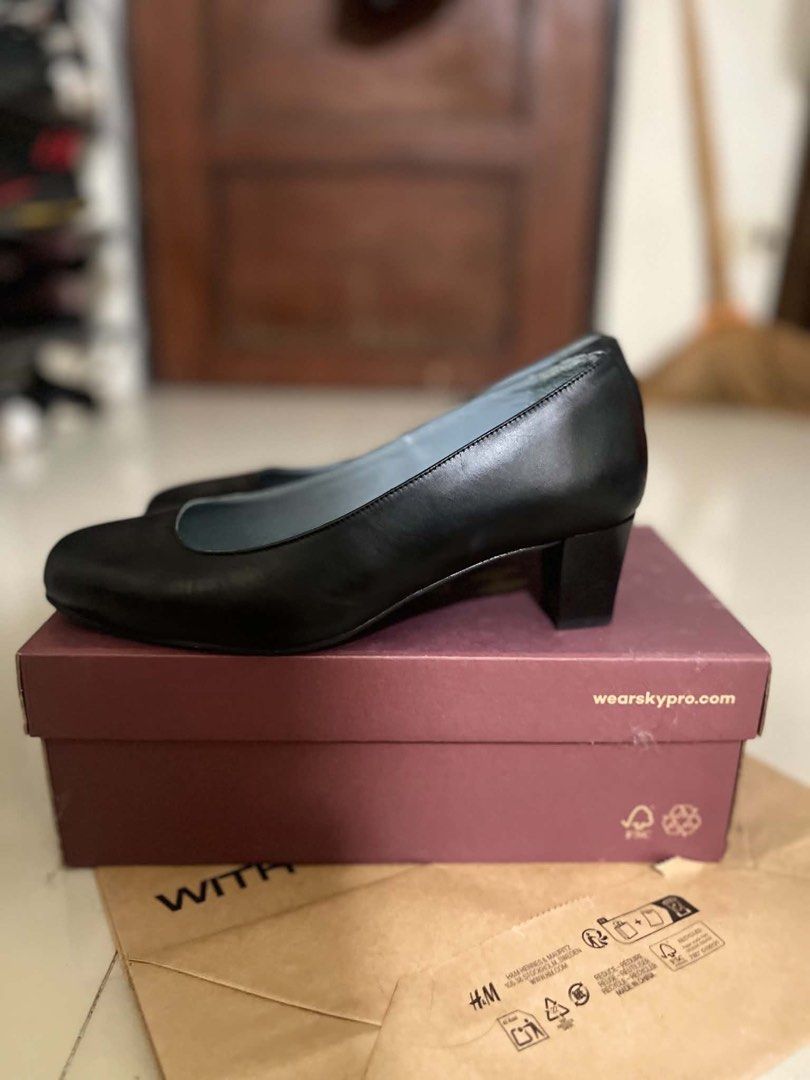 Skypro Black Leather Anti-Static Heels (Category: Heels) located in Davao. Submitted by jaydenpar40213 (Listing ID 1458831924, Image 2). Description: - Brand: Skypro - Color: Black - Material: Leather - Features: Anti-static, Alarm-free - Heel Height: Moderate (comfortable for all-day wear) - Condition: Comes with original box - Ideal for: Work.