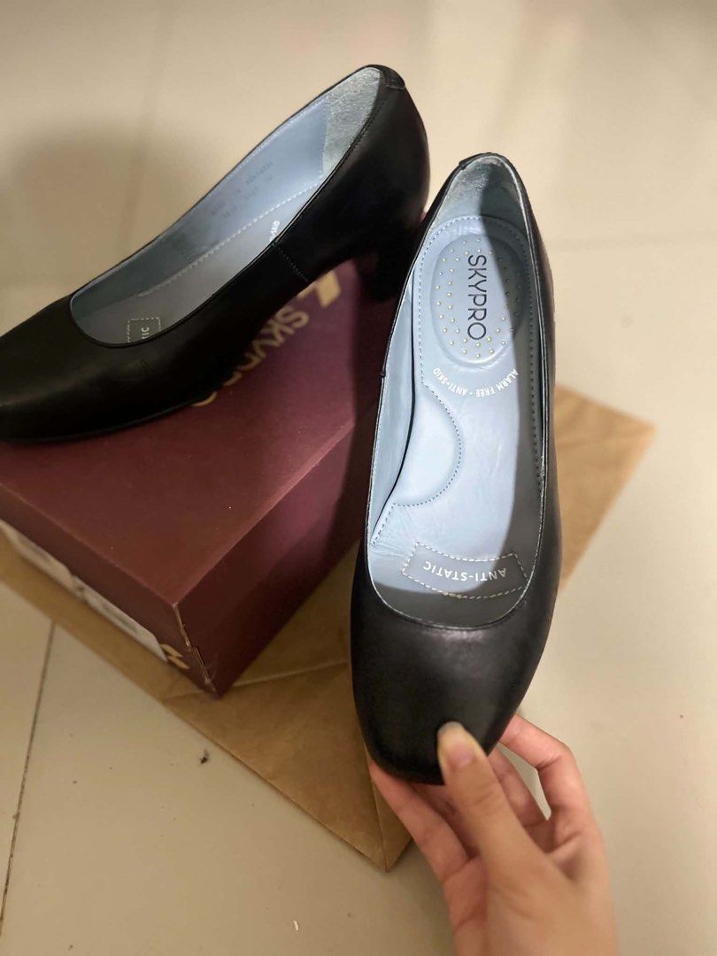Skypro Black Leather Anti-Static Heels (Category: Heels) located in Davao. Submitted by jaydenpar40213 (Listing ID 1458831924, Image 3). Description: - Brand: Skypro - Color: Black - Material: Leather - Features: Anti-static, Alarm-free - Heel Height: Moderate (comfortable for all-day wear) - Condition: Comes with original box - Ideal for: Work.