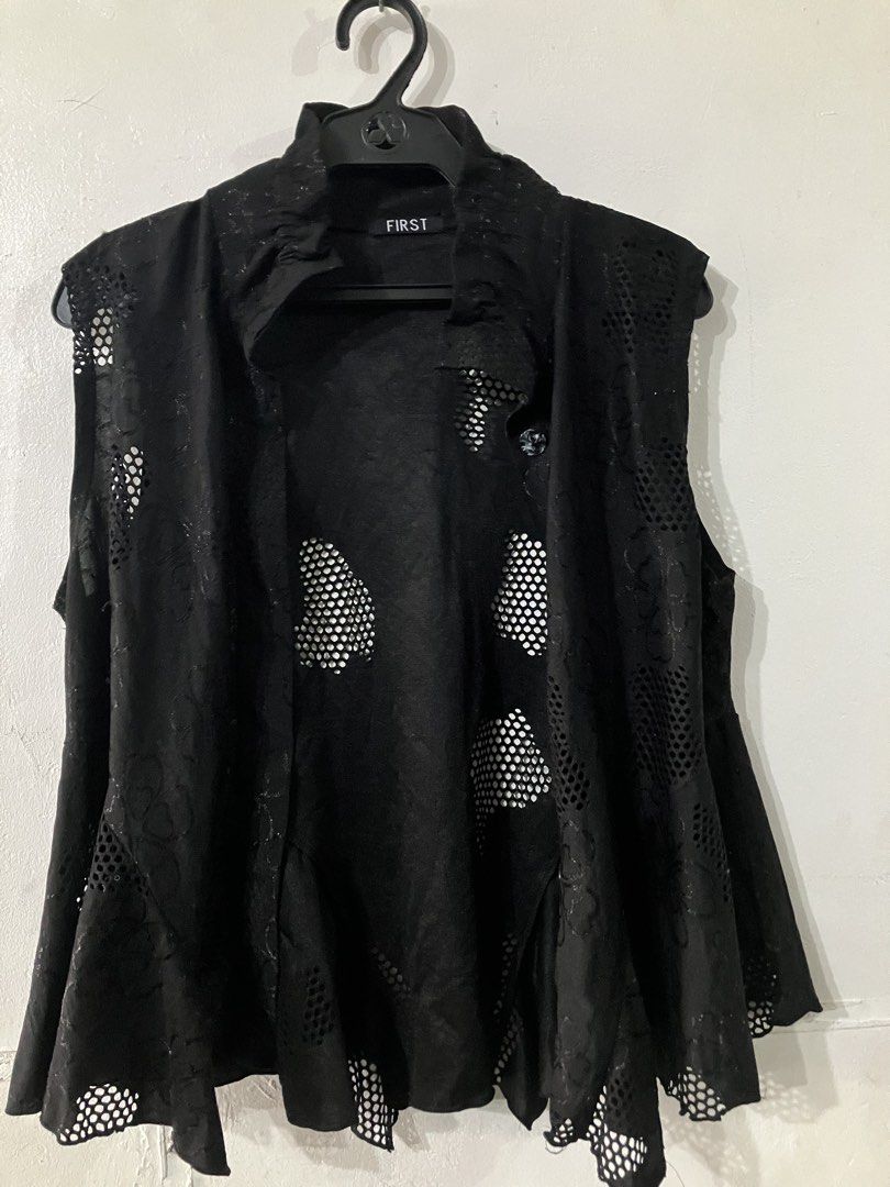 Sleeveless open front mesh vest (Category: Sleeveless) located in Angeles City. Submitted by jnwsurplus (Listing ID 1458717582, Image 1). Description: sleeveless open-front mesh vest featuring a gathered ruffled collar and patterned sheer cutouts..