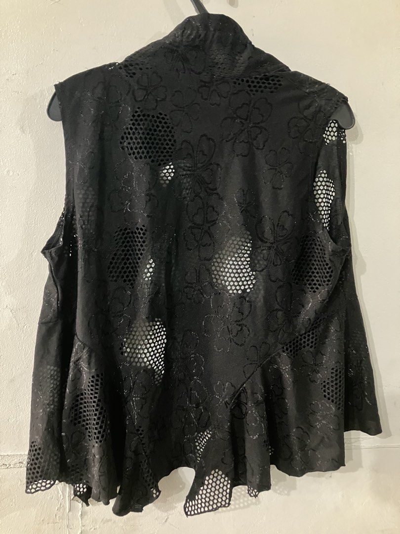 Sleeveless open front mesh vest (Category: Sleeveless) located in Angeles City. Submitted by jnwsurplus (Listing ID 1458717582, Image 3). Description: sleeveless open-front mesh vest featuring a gathered ruffled collar and patterned sheer cutouts..