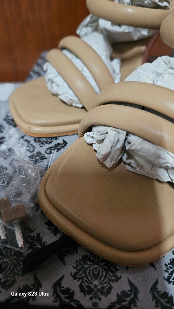 SM Store Olivia Beige Strappy Heels (Category: Heels) located in Paranaque City. Submitted by mystuffmel (Listing ID 1458774317, Image 2). Description: - Beige strappy heels from SM Store - Size 38 - Square toe design - Clear block heel - worn ocassionally with tags attached - Includes original box - Extra heel tips included.