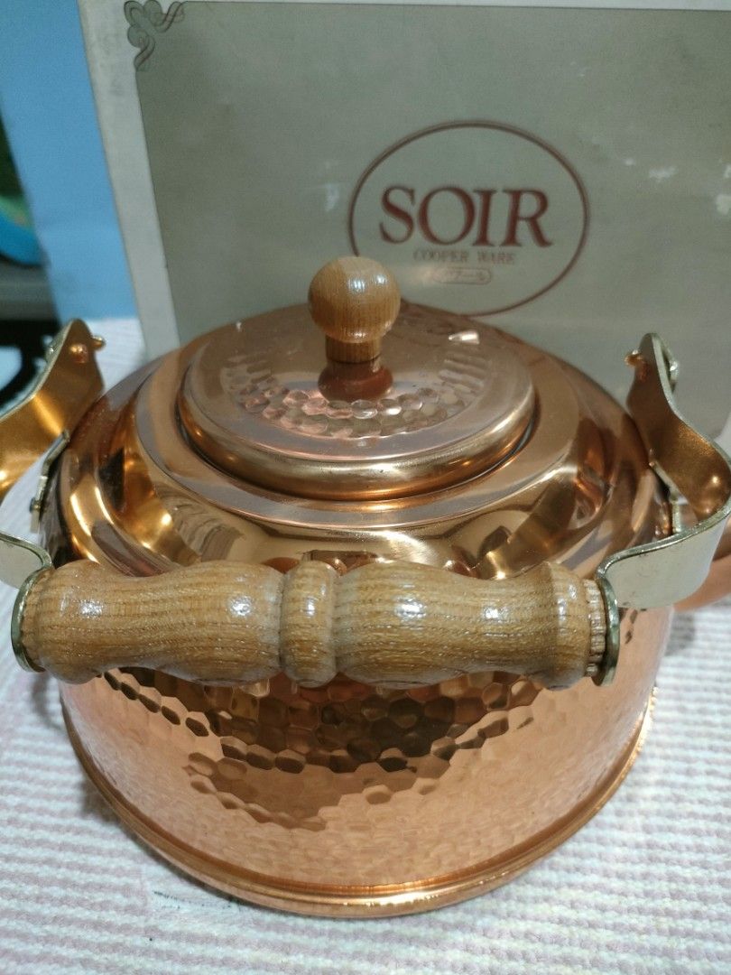 SOIR Copper Ware Hammered Kettle with Wooden Handle (Category: Coffee & Tea Tableware) located in Bulacan. Submitted by hunterherojapanjdm (Listing ID 1458796237, Image 2). Description: - Vintage SOIR copper kettle - Hammered texture all over the body - Wooden handle and lid knob for comfortable grip - Comes with original box - Great for display or use - Classic kitchen piece.