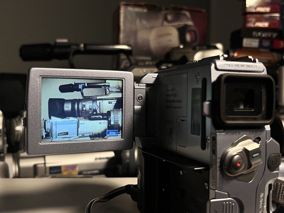 SONY DCR-PC9E MiniDv Camcorder [ENGLISH] (Category: Video Cameras) located in Manila. Submitted by yumeme (Listing ID 1458856942, Image 3). Description: SONY DCR-PC9E MiniDv Camcorder [ENGLISH] Condition: 9/10 [Like New] Price: 9,000php 100% Fully Functional & Tested Unit English Language Unit Nightshot / Night Vision Touch-Screen Works Perfectly All Tape Functions Working Viewfinder is Clear Inclusions: Sony NP-FM (M) Battery [BRAND NEW] NP-FM B