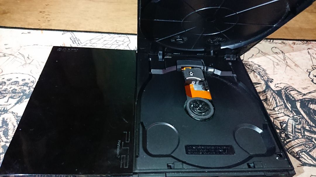 Sony PlayStation 2 Slim (Category: PlayStation) located in La Trinidad. Submitted by raffy_8810 (Listing ID 1458803020, Image 3). Description: PlayStation 2 Slim Model No.: SCPH-90004 Region: PAL-Europe Accessories: * PS2 AV cable * Power cord (uses a Europlug type; needs an adapter) * Network cable * 1 - DualShock 2 Controller with vibration * 1 - 8MB Magic Gate Memory card Include: * 1 - Burned backup copy game disc (DVD-R, Midnight Club II) Mo