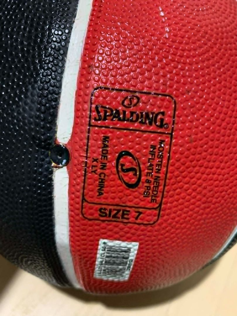Spalding Chicago Bulls Basketball (Category: Racket and Ball Sports) located in Manila. Submitted by musedeclutters (Listing ID 1458748582, Image 3). Description: Spalding Chicago Bulls basketball. Black and red with bull head logo. Good grip for playing or collecting..