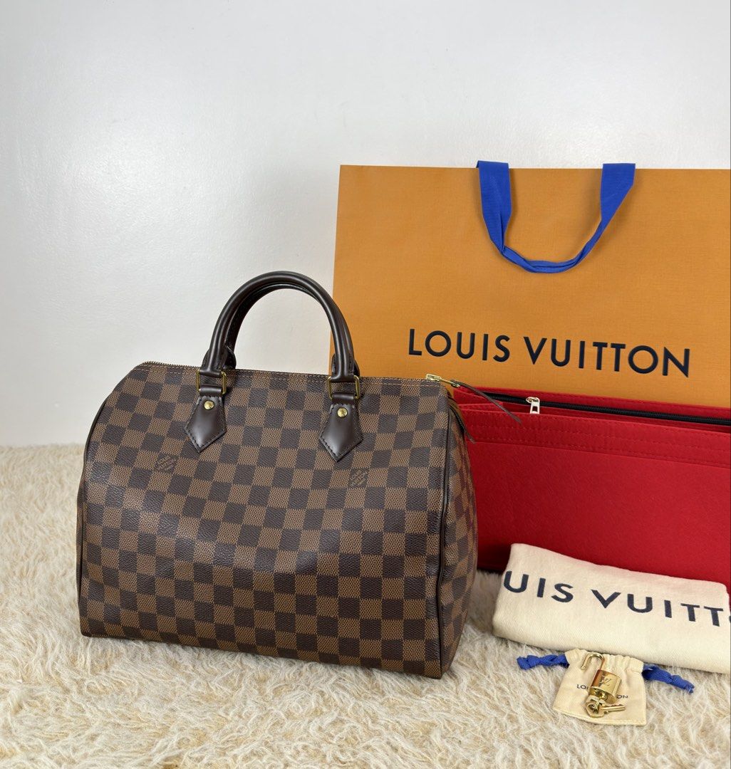 Speedy 30 Damier Ebene Canvas (Category: Luxury Bags & Wallets) located in Manila. Submitted by luxuryprelovedbagsby_by_agnes (Listing ID 1458720055, Image 1). Description: Speedy 30 Damier Ebene Canvas Php 58,000 Excellent Condition Dimensions: 30cm x 21cm x 17cm LOUIS.