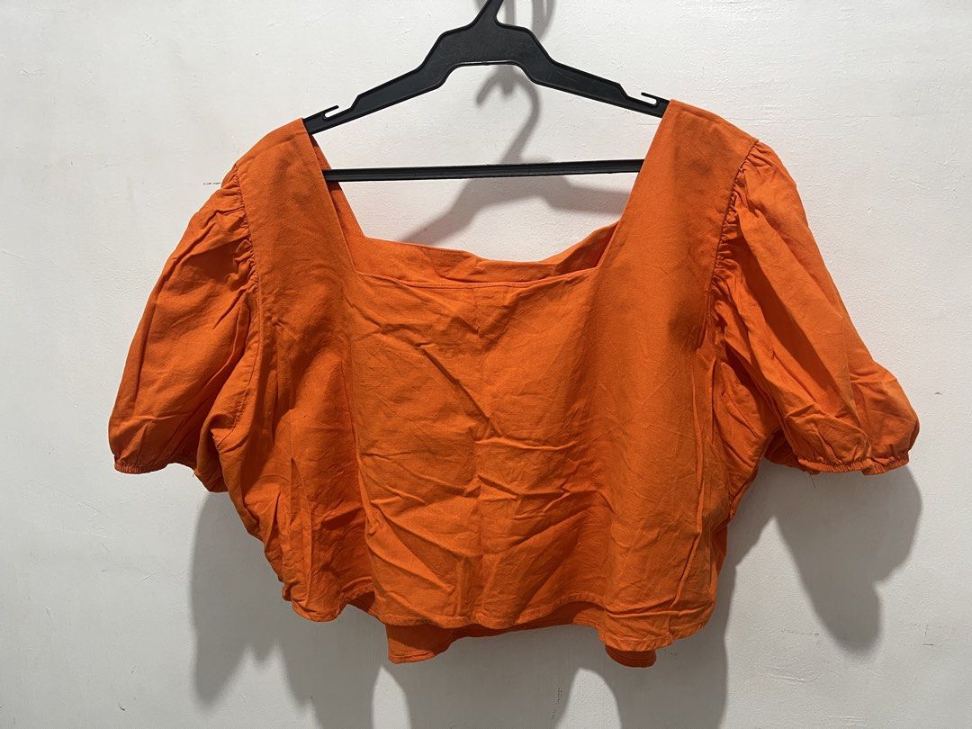 Square Neck Puff Sleeve Crop Top (Category: Blouses) located in Manila. Submitted by cestl_avie07 (Listing ID 1458800852, Image 1). Description: - Cute square neck crop top - Features stylish puff sleeves - Available in vibrant orange and pink - Lightweight fabric, ideal for warm weather - Versatile for casual or dressed-up outfits - Pairs perfectly with high-waisted bottoms.