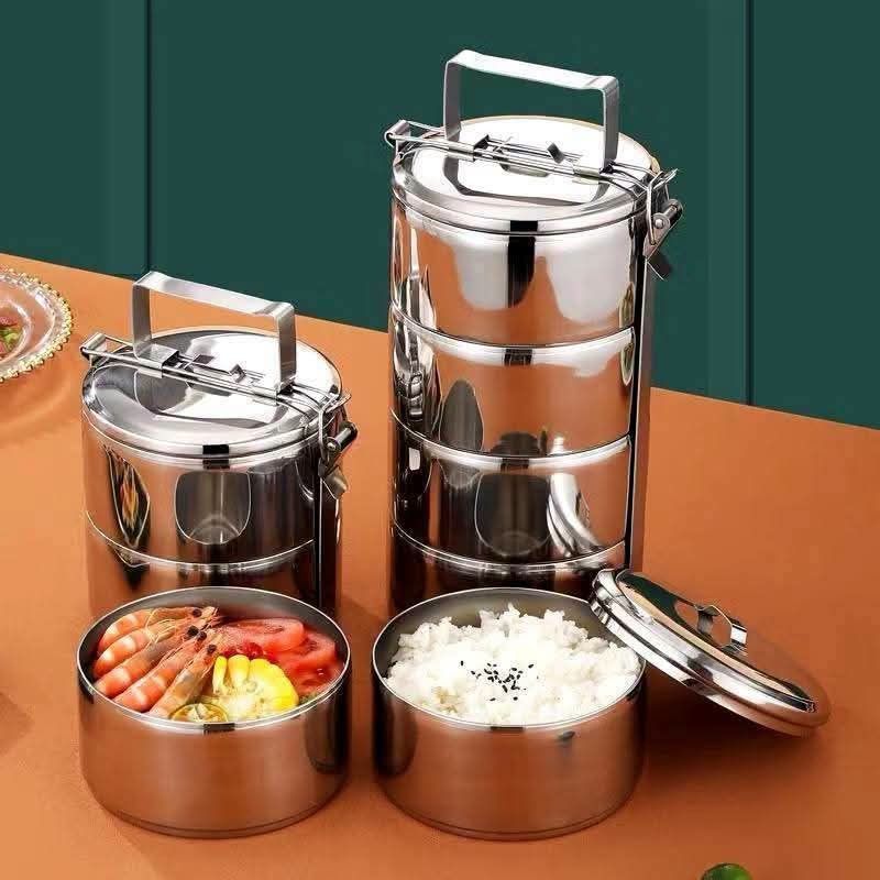Stainless Steel Stackable Lunch Box Tiered Food Container (Category: Food Organization & Storage) located in Manila. Submitted by iliasjen3082126 (Listing ID 1458779439, Image 1). Description: - Stackable stainless steel lunch box - Ideal for school or office lunches - Each tier is a separate container - Features a convenient top handle fo easy carrying - Durable and easy to clean - Keeps food fresh and prevents mixing - Multiple tiers allow for 