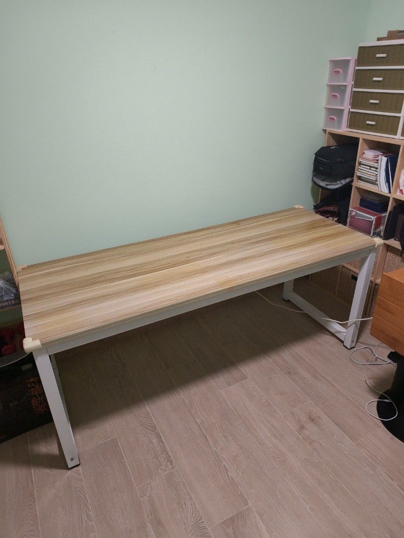 Table (Category: Tables & Sets) located in Singapore. Submitted by kimweiliang (Listing ID 1458848306, Image 3). Description: Long Table. Dimensions L 180cm x W 70cm x H 73.5cm. Very sturdy because of steel frame. Used for several months, slight fading of colour on one edge, otherwise looks brand new. Bought for around $300. Seller to arrange own pick up..