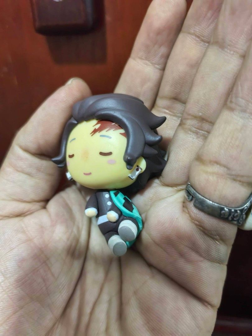 Tanjiro Kamado Chokonokko Mini Figure (Category: Figurines & Statues) located in Cebu City. Submitted by dudes_villanueva (Listing ID 1458696594, Image 2). Description: Figure - Tanjiro Kamado Chokonokko Mini Figure No Markings 📌 From the anime Demon Slayer: Kimetsu no Yaiba. 📌 Character: Tanjiro Kamado in a cute chibi style. 📌 Design: He has a calm, smiling expression with rosy cheeks and wears his checkered uniform with a turquoise accent. �