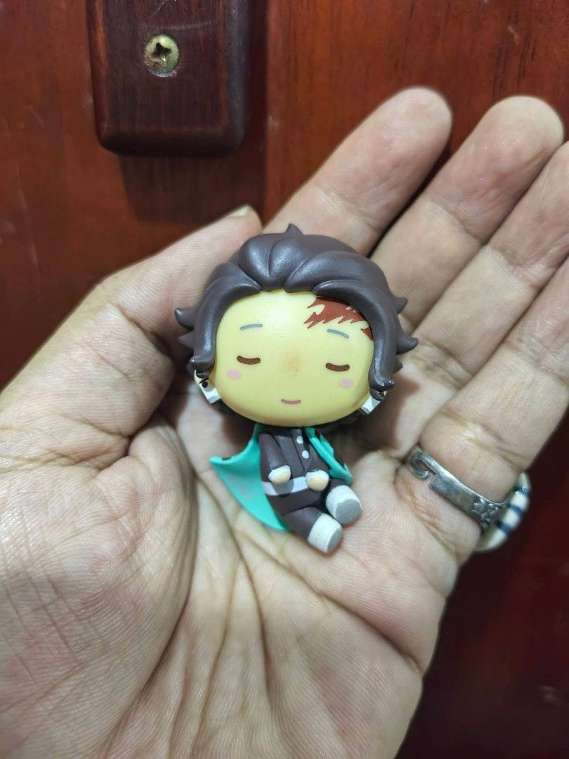 Tanjiro Kamado Chokonokko Mini Figure (Category: Figurines & Statues) located in Cebu City. Submitted by dudes_villanueva (Listing ID 1458696594, Image 1). Description: Figure - Tanjiro Kamado Chokonokko Mini Figure No Markings 📌 From the anime Demon Slayer: Kimetsu no Yaiba. 📌 Character: Tanjiro Kamado in a cute chibi style. 📌 Design: He has a calm, smiling expression with rosy cheeks and wears his checkered uniform with a turquoise accent. �