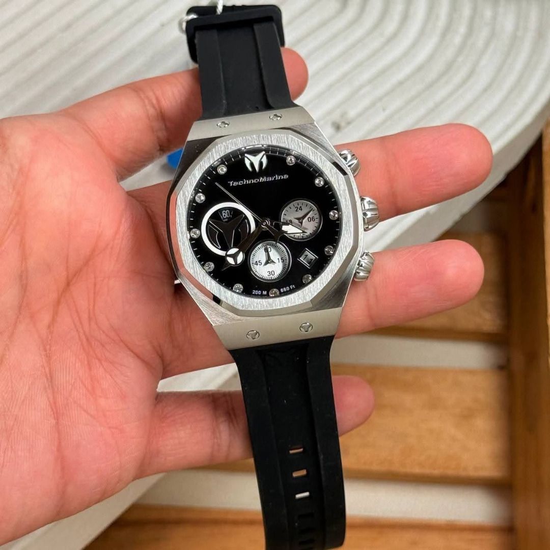 TechnoMarine Chronograph Watch Black Dial (Category: Men's Watches) located in Caloocan City. Submitted by cha_essentials2026 (Listing ID 1458827244, Image 3). Description: - Authentic TechnoMarine watch - Features a sleek black dial with chronograph functions - Durable stainless steel case - Comfortable black rubber strap - Comes with its original box - Versatile for everyday wear or special events.