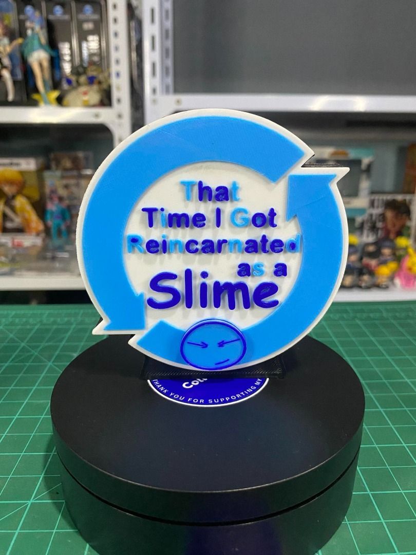 That Time I Got Reincarnated as a Slime 3d Printed Standee (Category: Figurines & Statues) located in Angeles City. Submitted by rickki_t (Listing ID 1458842131, Image 1). Description: - Acrylic standee featuring Rimuru Tempest from That Time I Got Reincarnated as a Slime. - Eye-catching blue and white design with rotating arrow accents. - Ideal for displaying on your desk, shelf, or any fan space. - A must-have collectible for fans of the anime 