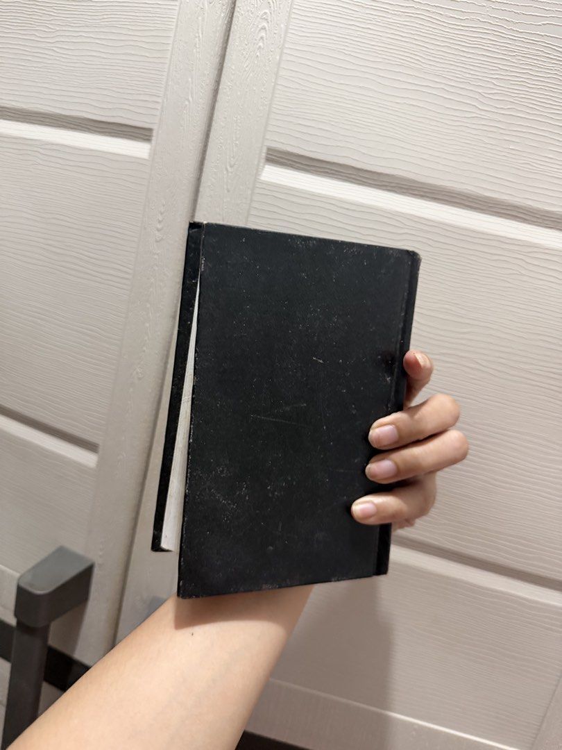 The Labor Code of the Philippines REX Book Store (Category: Textbooks) located in Davao. Submitted by fabdeclutter (Listing ID 1458875697, Image 3). Description: - Labor Code of the Philippines by REX Book Store - Covers labor laws and regulations - Features a black hardcover and is quite thick - Pages are yellowed from age, indicating it's a well-loved reference - Minor scuffs on the cover, consistent with a used book - Perfect for legal studies