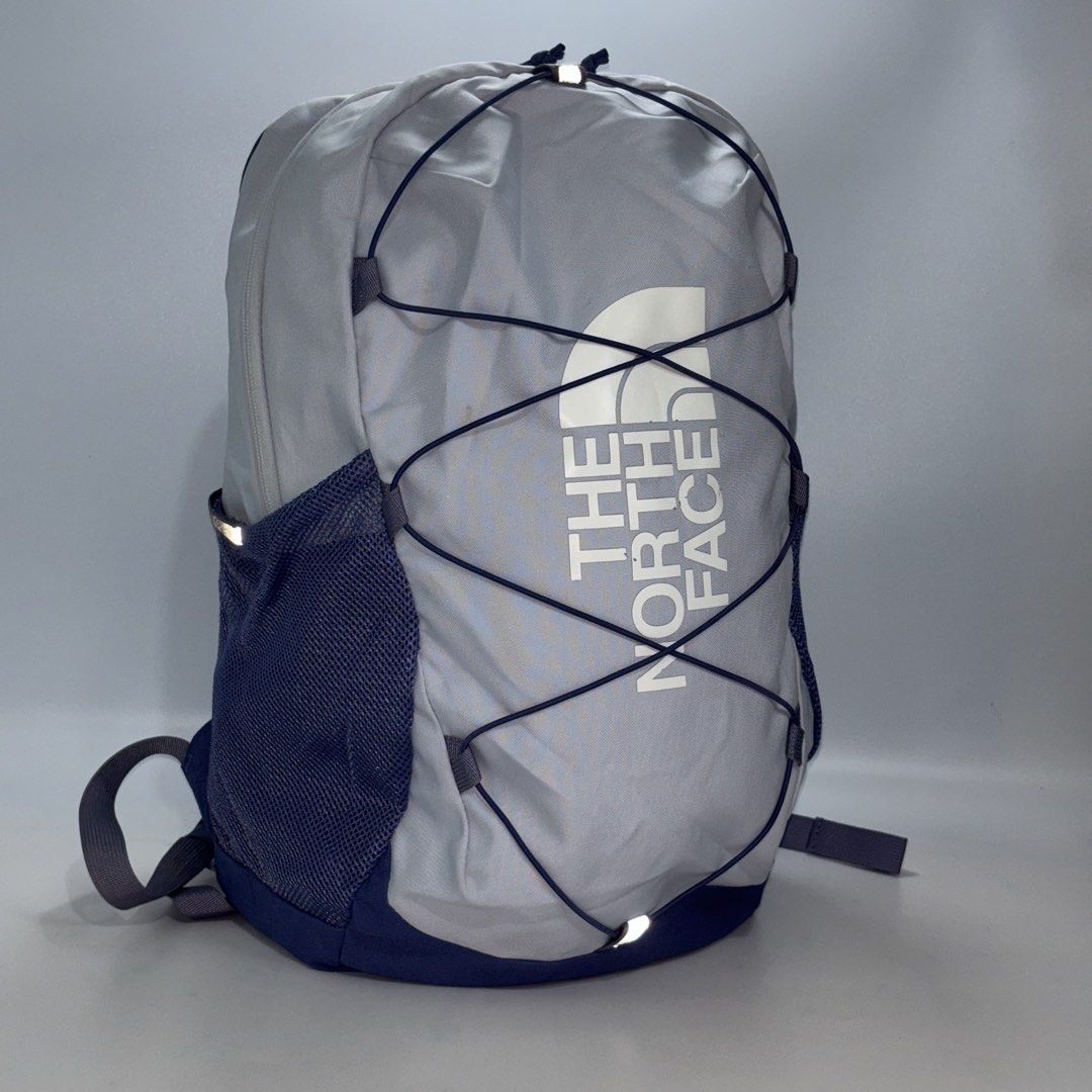 The North Face Borealis Backpack Grey Navy (Category: Backpacks) located in Cavite. Submitted by sidirvinp76902 (Listing ID 1458840928, Image 1). Description: - Grey and navy backpack from The North Face - Elastic bungee cords on the front - Side mesh pockets for water bottles - Padded shoulder straps for comfort - Interior name tag area - Ideal for school or day trips.
