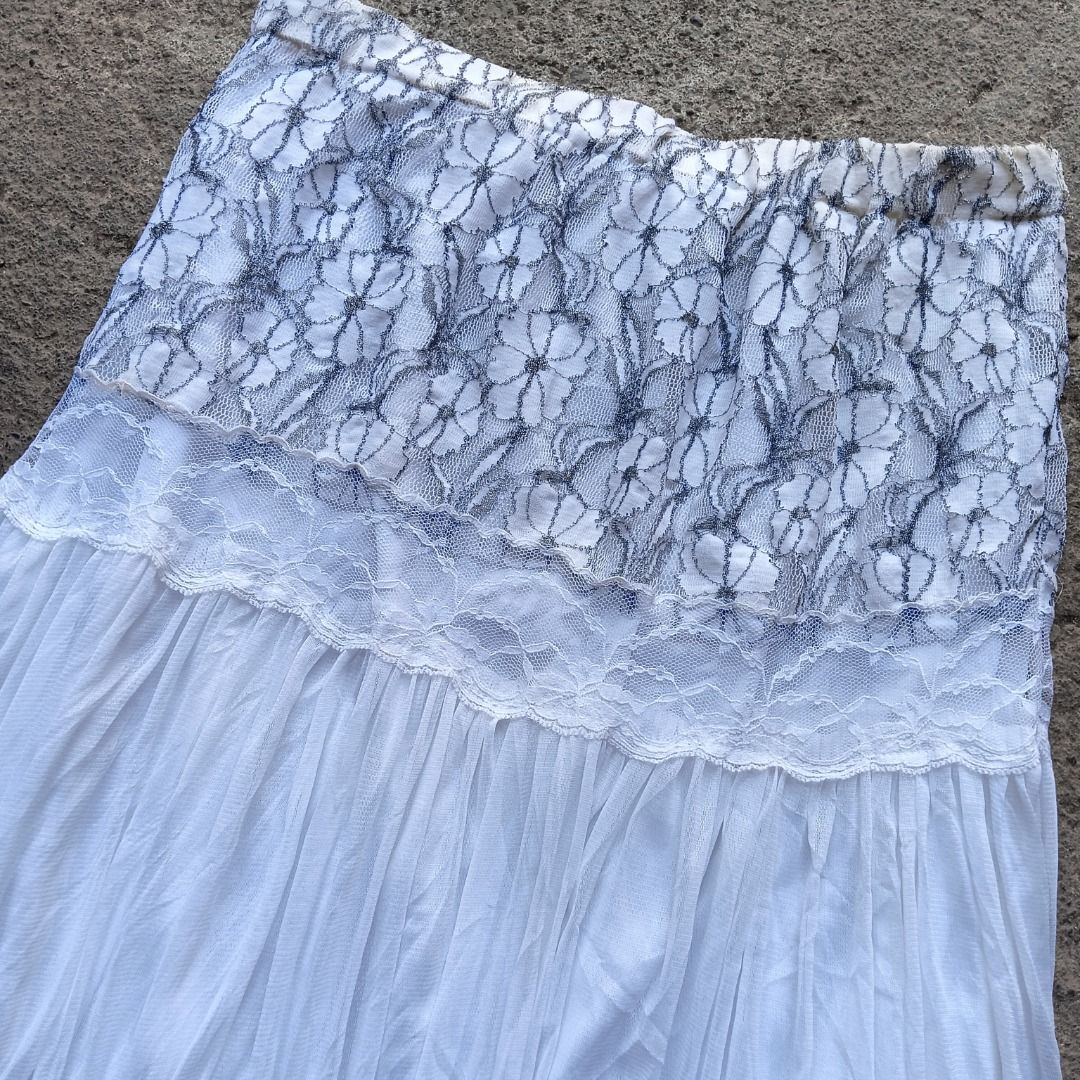 Tiered Lace Maxi Skirt White (Category: Skirts) located in Davao. Submitted by calli_2219 (Listing ID 1458757643, Image 2). Description: - White tiered maxi skirt - Features delicate lace detailing on tiers - Comfortable elastic waistband - Flowy, bohemian style - Ideal for summer or casual outfits - Pairs well with simple tops 28-34.