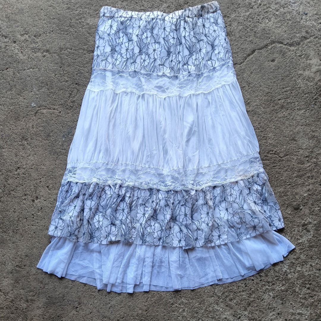 Tiered Lace Maxi Skirt White (Category: Skirts) located in Davao. Submitted by calli_2219 (Listing ID 1458757643, Image 1). Description: - White tiered maxi skirt - Features delicate lace detailing on tiers - Comfortable elastic waistband - Flowy, bohemian style - Ideal for summer or casual outfits - Pairs well with simple tops 28-34.