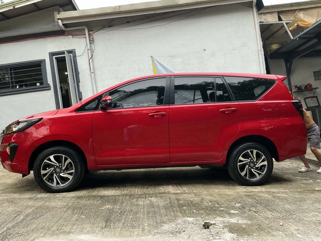 Toyota INNOVA E 2.8L E auto Auto (Category: Used Cars) located in Antipolo. Submitted by bryan.lino (Listing ID 1458797813, Image 3). Description: 2022 Toyota Innova E 2.8L A/T (New look) ☝️ READ FIRST ✅ FINANCING, low dp ✅ TRADE IN/SWAPP ALL IN DOWN PAYMENT - PHP 80k 60 months- 25,958 48 months - 29,000 36 months - 35,314 ✅ Owner seller ✅ all orig papers! Ready for transfer ✅ Ncr file ✅ black matte garnish ✅ rain visor ✅ metallic red ✅ low milea