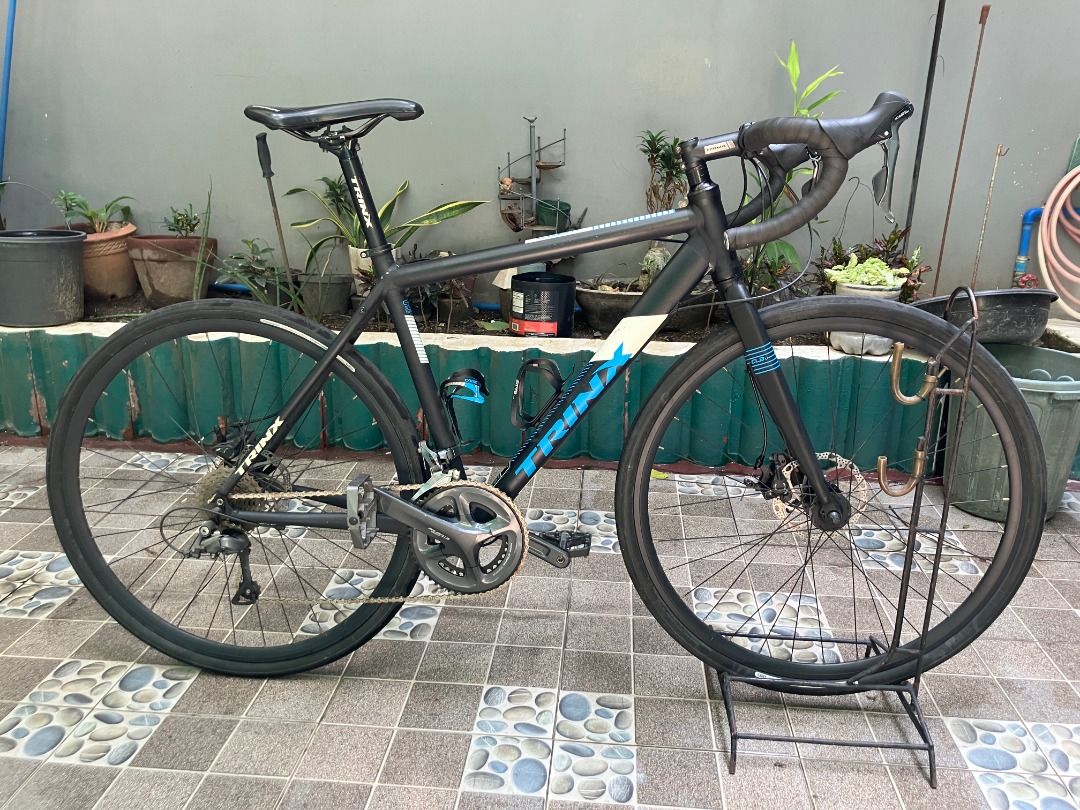 TRINX climber 1.1 Bike (Category: Bicycles) located in Pasig City. Submitted by oznerolorenzo (Listing ID 1458786271, Image 2). Description: Price: 9,000 pesos. Price is negotiable. Condition: Well Used Reason for selling: Need Space, Decluttering, Di na ginagamit, etc. Location: Santa Lucia, Pasig City ISSUES: front derailleur not working properly - Trinx climber 1.1 size 50cm alloy frameset (may bike skin sa frame) - Groupset : Shimano Claris r