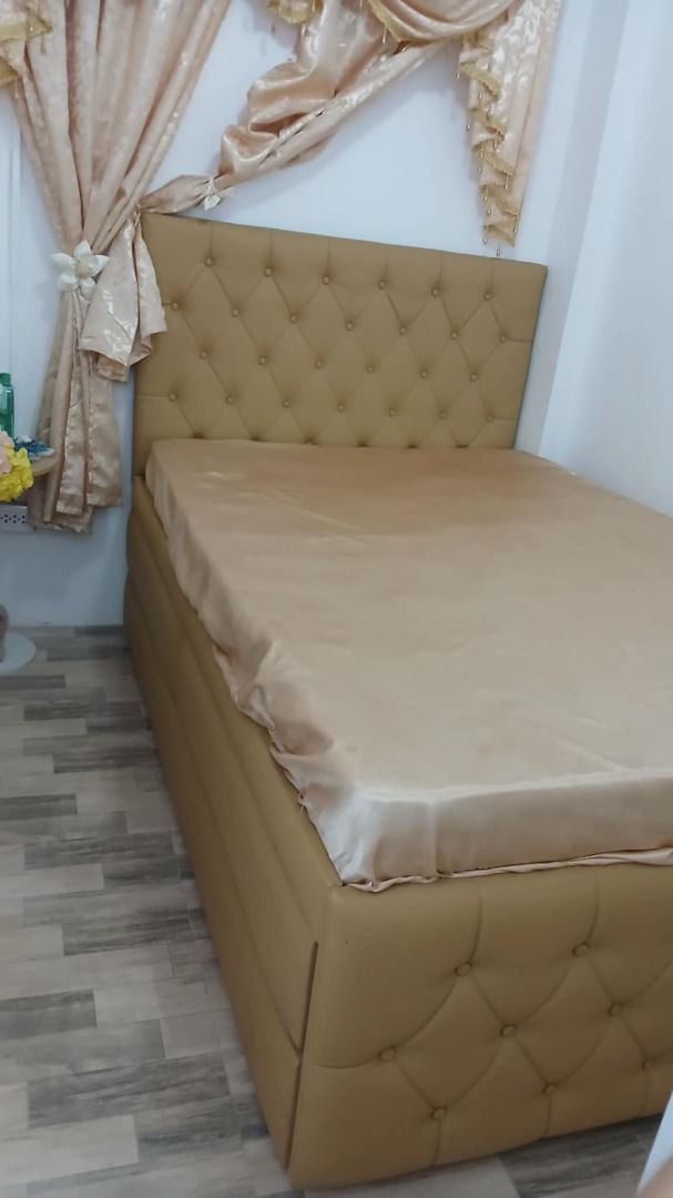 Tufted Headboard Bed Frame with Storage Base (Category: Bed Frames & Mattresses) located in Caloocan City. Submitted by newcat-ca23 (Listing ID 1458724528, Image 3). Description: - Stylish bed frame with elegant tufted headboard - Gorgeous muted gold/mustard yellow color - Built-in storage base for extra space - Comes with a fitted sheet - Perfect for maximizing space We can do •Sleek •Stylish •Innovative •Minimalistic we can also customize any d