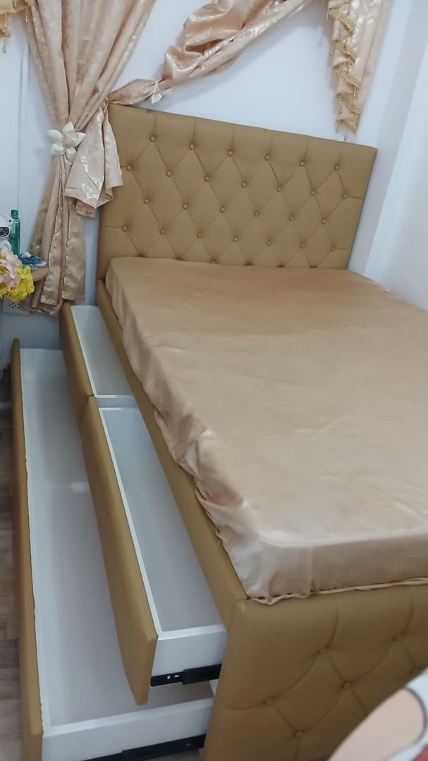 Tufted Headboard Bed Frame with Storage Base (Category: Bed Frames & Mattresses) located in Caloocan City. Submitted by newcat-ca23 (Listing ID 1458724528, Image 1). Description: - Stylish bed frame with elegant tufted headboard - Gorgeous muted gold/mustard yellow color - Built-in storage base for extra space - Comes with a fitted sheet - Perfect for maximizing space We can do •Sleek •Stylish •Innovative •Minimalistic we can also customize any d