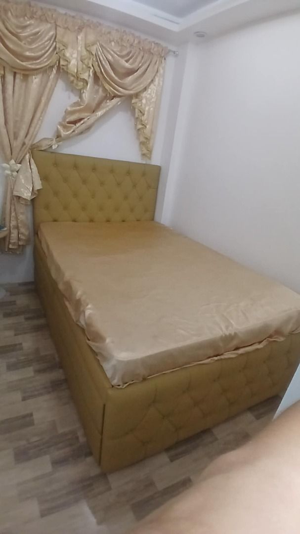 Tufted Headboard Bed Frame with Storage Base (Category: Bed Frames & Mattresses) located in Caloocan City. Submitted by newcat-ca23 (Listing ID 1458724528, Image 2). Description: - Stylish bed frame with elegant tufted headboard - Gorgeous muted gold/mustard yellow color - Built-in storage base for extra space - Comes with a fitted sheet - Perfect for maximizing space We can do •Sleek •Stylish •Innovative •Minimalistic we can also customize any d